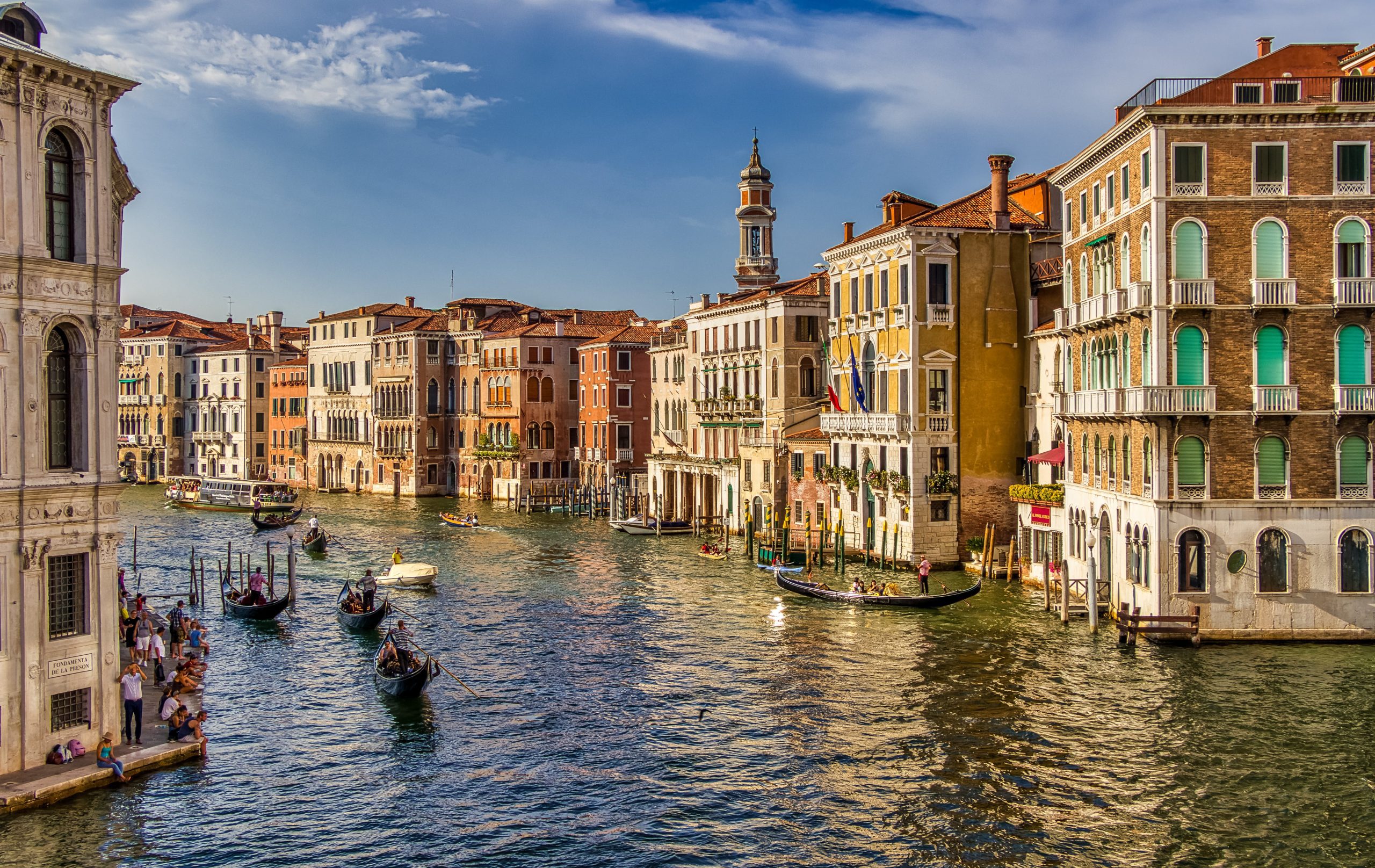 Taking a gondola ride in Venice