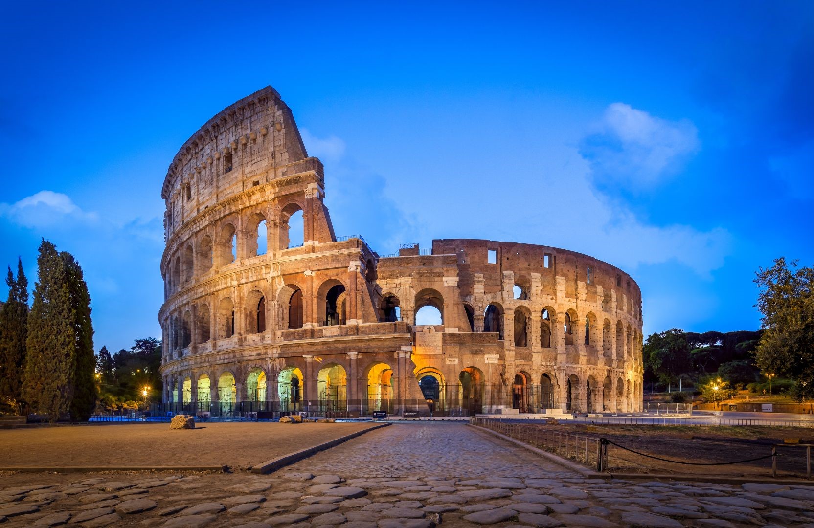 The Colosseum, Rome's iconic symbol of ancient gladiatorial battles and architectural prowess.